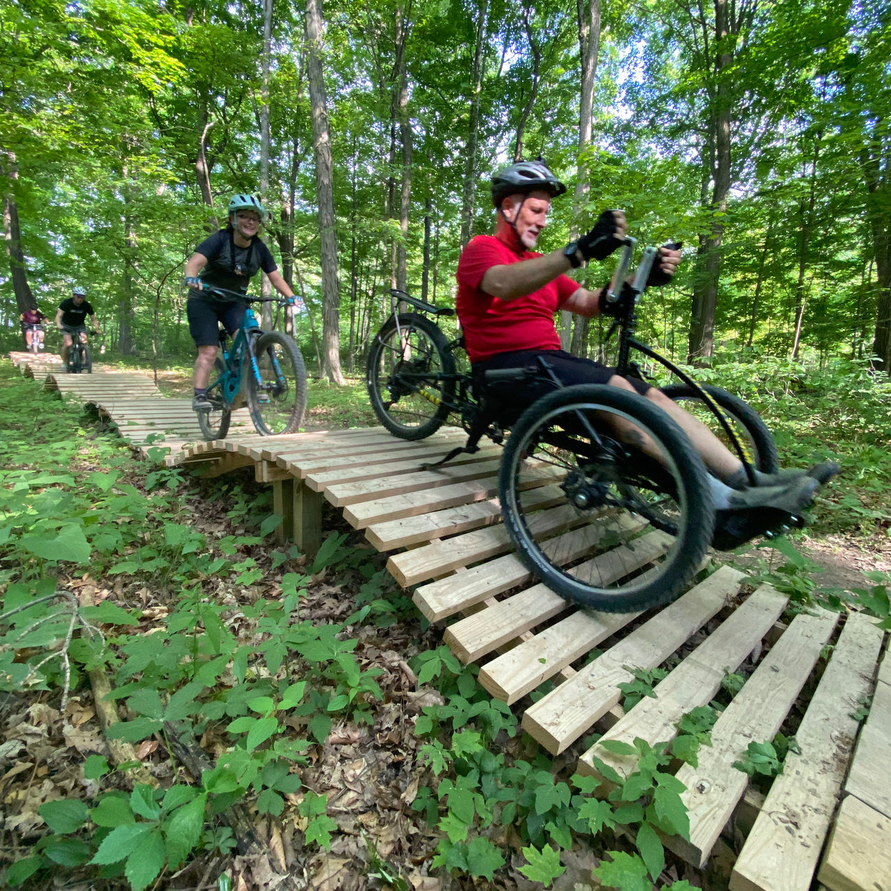 Mountain bikers ride a trail in Alum Creek SP