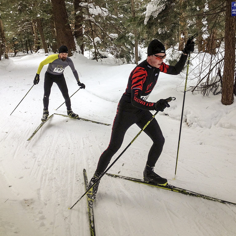 Cross country skiers ski on trails at The Wilderness Lodge