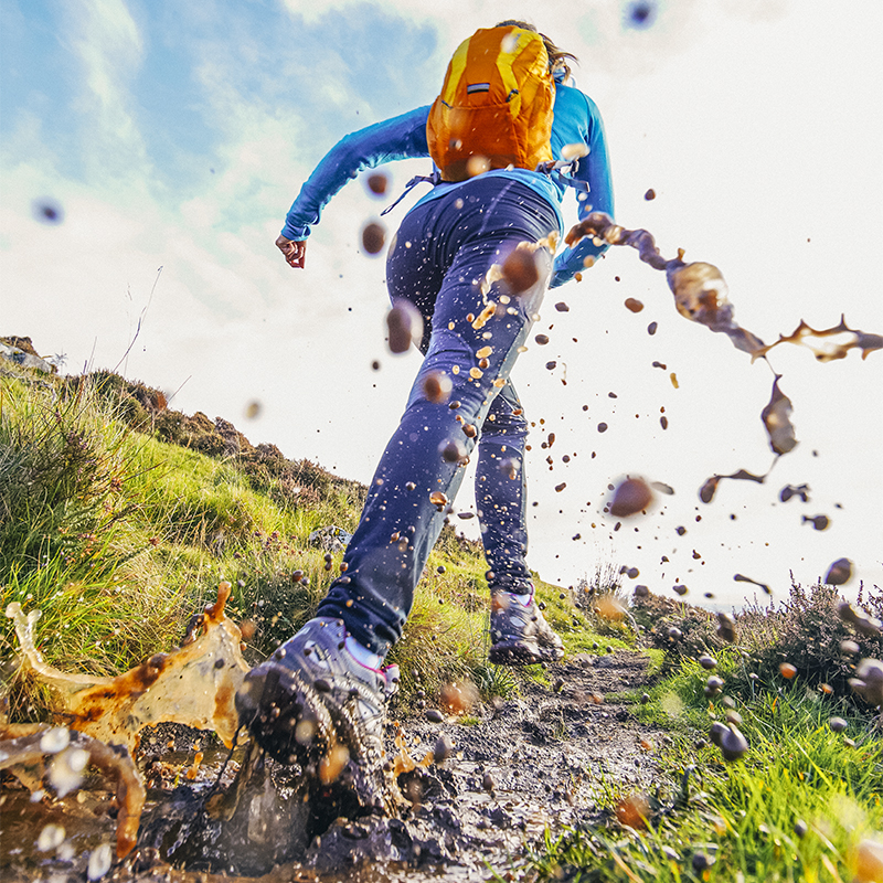 Trail running in the mud on the isle of Skye, Scotland.