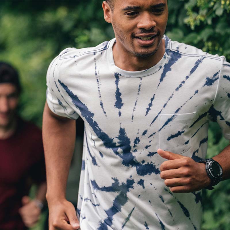 Closeup of runner wearing a tech watch